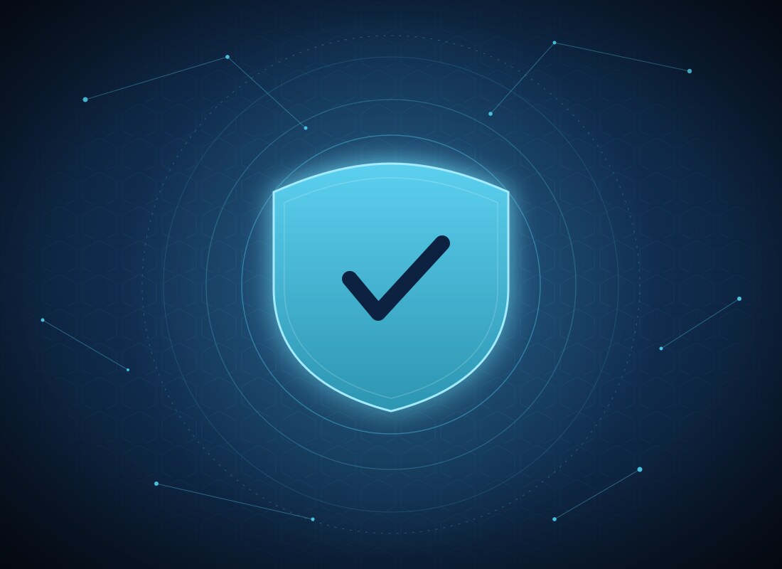 Glowing cyan security shield with checkmark on navy hex-grid background — enterprise cyber security for Bergen County NJ businesses